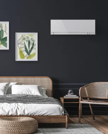 Climatiseur mural Mitsubishi Electric dans une chambre